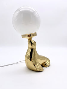 Vintage brass sea lion lamp